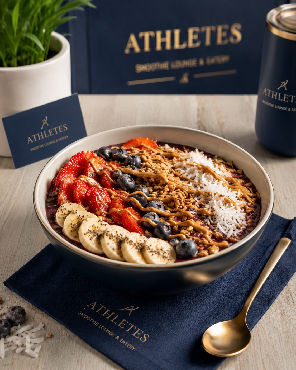 Açaí bowl topped with strawberries, banana, blueberries and granola