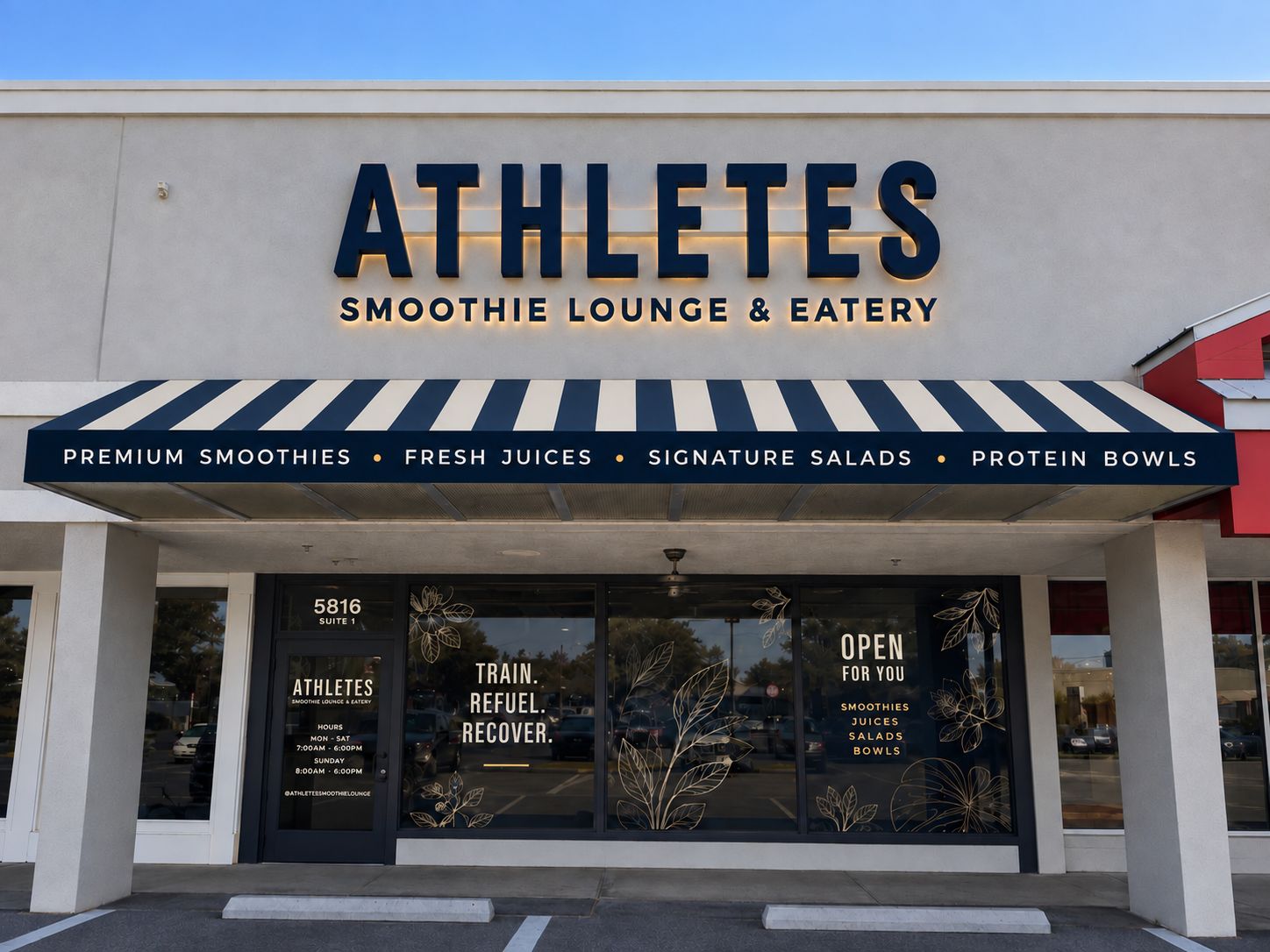 ATHLETES storefront on Conroy Rd — illuminated sign above a navy and cream striped awning reading Premium Smoothies, Fresh Juices, Signature Salads, Protein Bowls