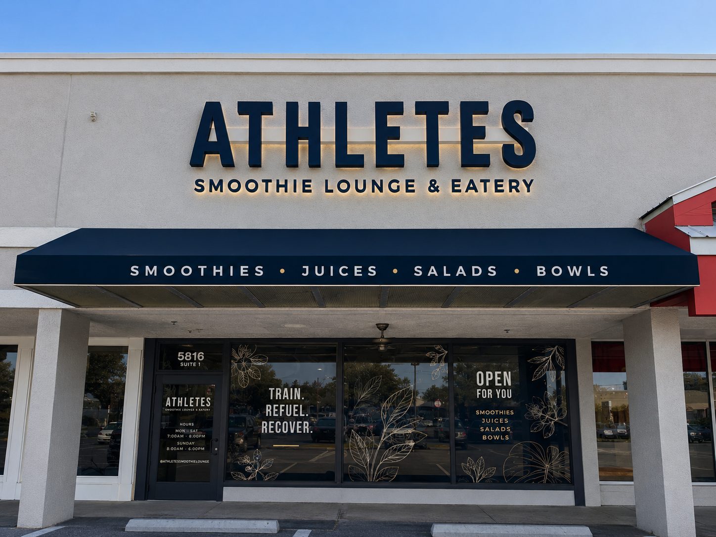 ATHLETES storefront with navy awning — Smoothies, Juices, Salads, Bowls